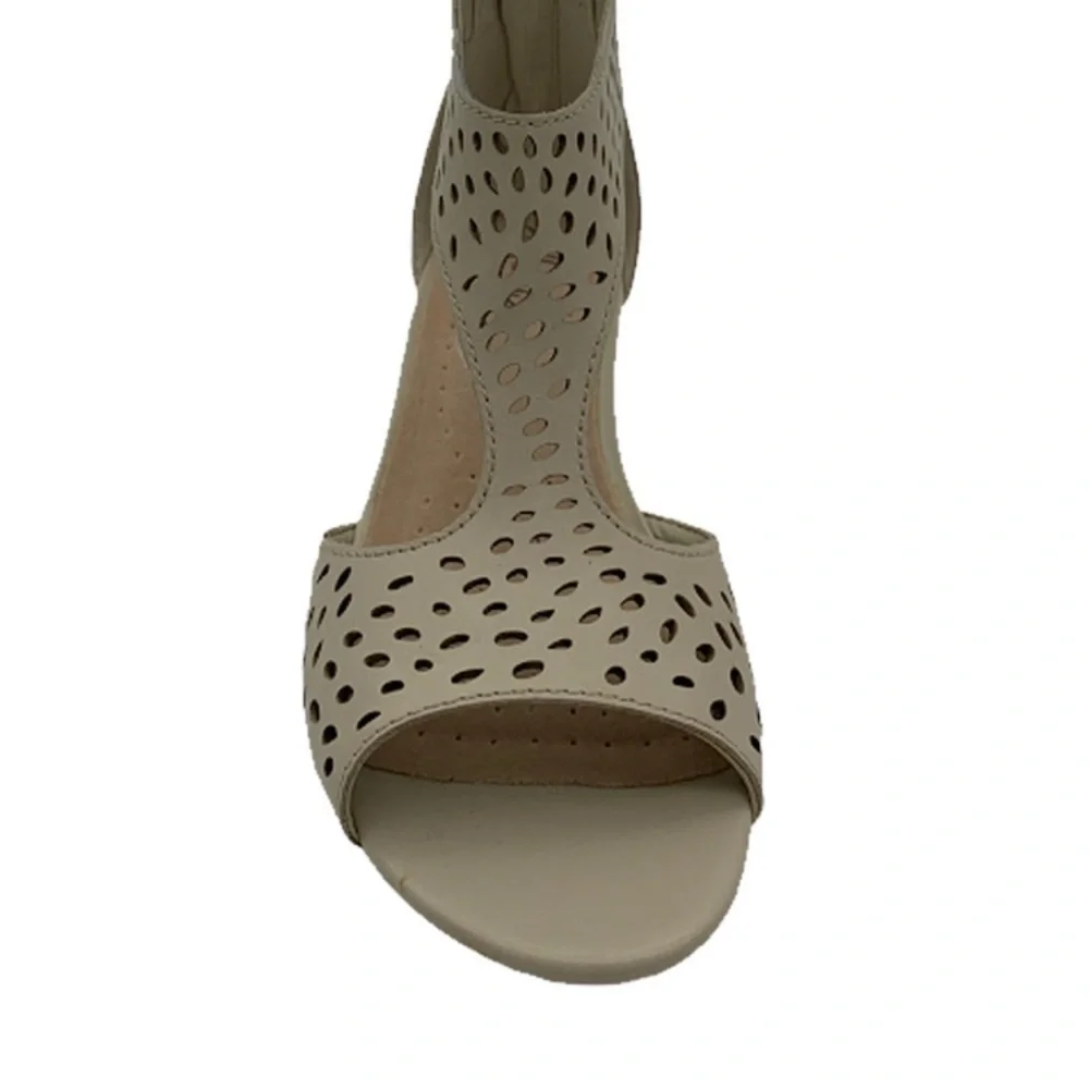 Collection by Clark’s. Abigail Ruby in Ivory. Perforated leather‎ wedges. 8.5